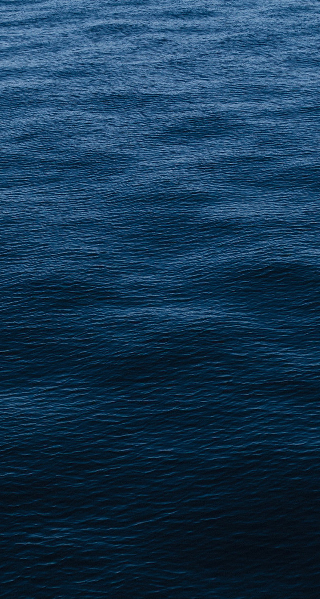 Lone boat ocean sunny blue free wallpaper - medium preview image