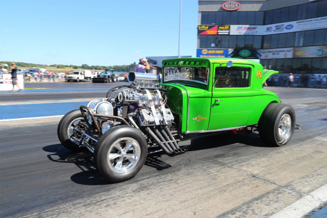 Green truck engine street building free wallpaper - medium preview image