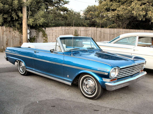Blue car white fence trees free wallpaper - medium preview image