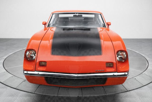 Orange sports car circular display free wallpaper - medium preview image