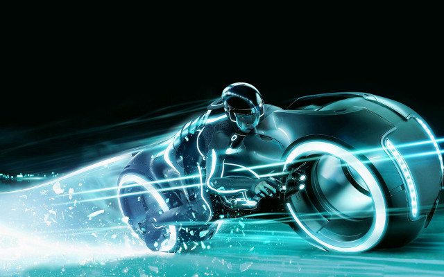 Futuristic motorcycle glowing wheelie man free wallpaper - medium preview image