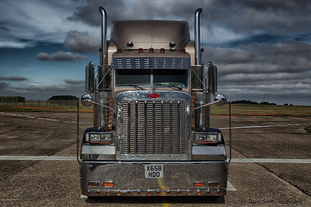 Semi truck runway cloudy sky free wallpaper - medium preview image