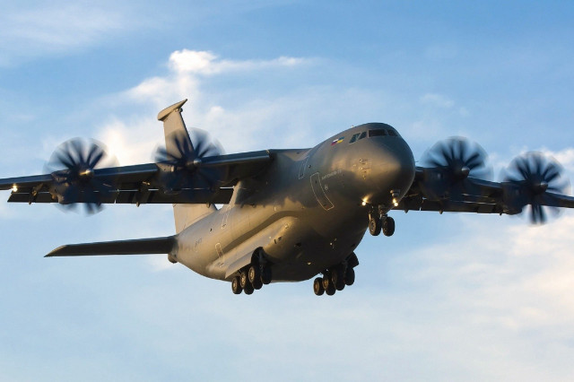 Large airplane flying blue sky #3 free wallpaper - medium preview image