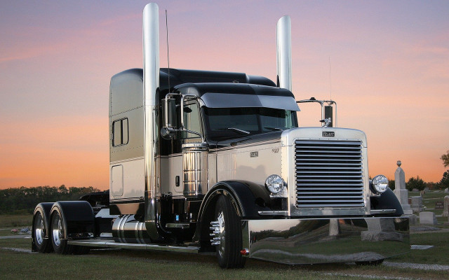 Semi truck field sunset statue free wallpaper - medium preview image