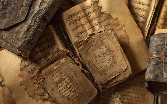 Old books writing table bag free wallpaper - medium preview image