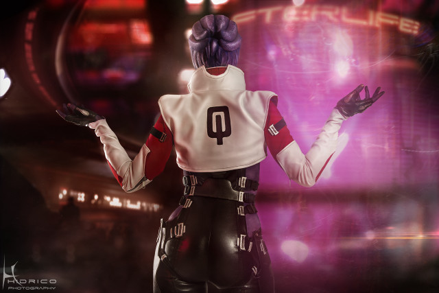 Woman costume knife cellphone futuristic free wallpaper - medium preview image