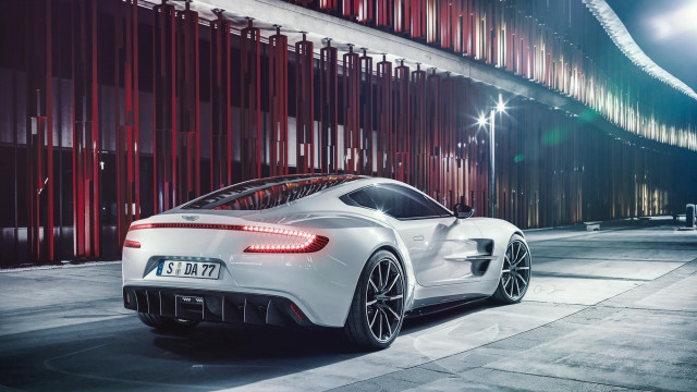 White sports car parked building #3 free wallpaper - medium preview image