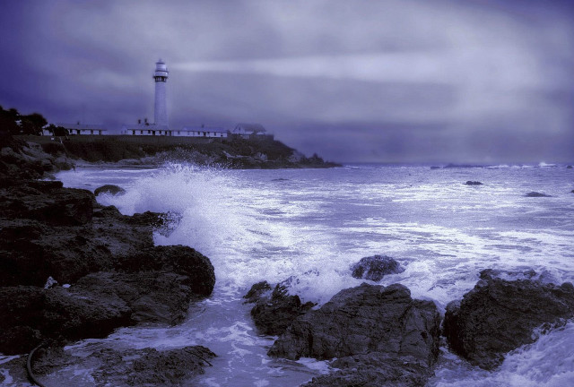 Lighthouse rocky shore waves stormy free wallpaper - medium preview image