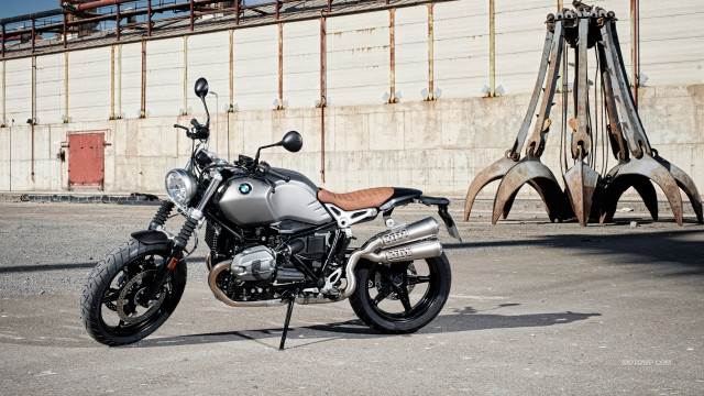 Motorcycle parking lot metal sculpture free wallpaper - medium preview image