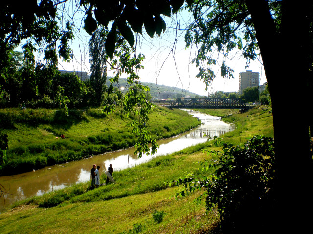 People walking green field river free wallpaper - medium preview image