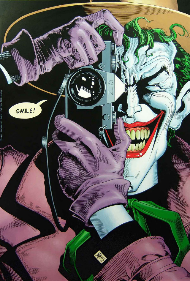 Joker holding camera pointing smiling free wallpaper - medium preview image