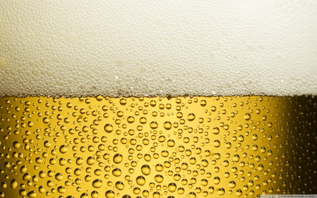 Beer closeup waterdrops yellow black free wallpaper - medium preview image