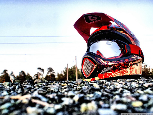 Helmet pile rocks gravel sky free wallpaper - medium preview image