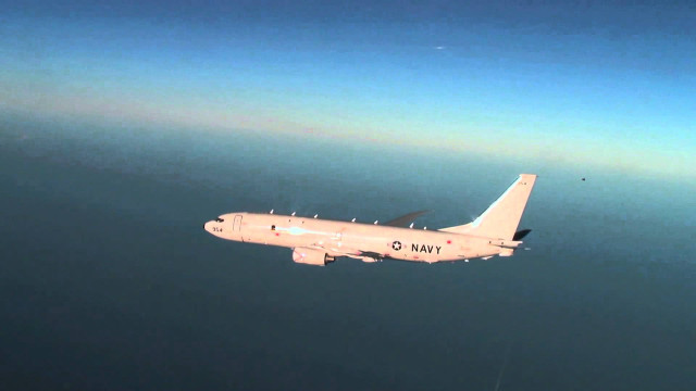 Military plane flying ocean clear free wallpaper - medium preview image