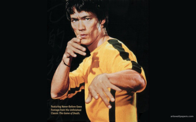 Man yellow shirt serious hand #2 free wallpaper - medium preview image