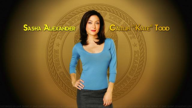 Woman blue shirt gold background free wallpaper - medium preview image