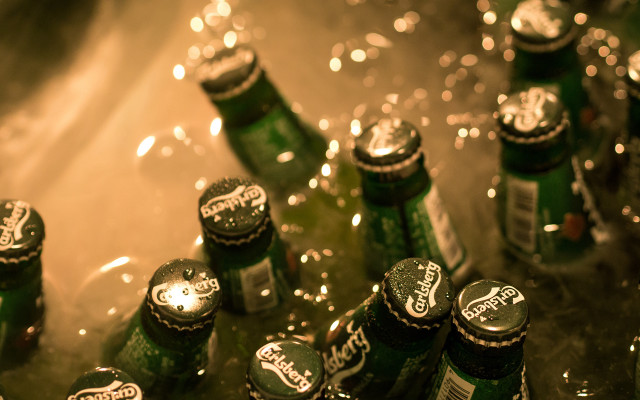 Green bottles beer tilt shift free wallpaper - medium preview image