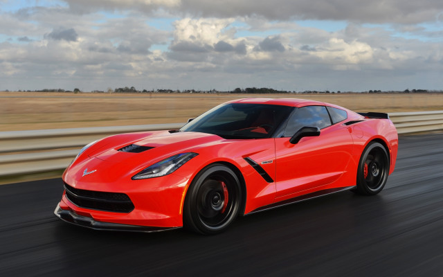 Red sports car driving cloudy #2 free wallpaper - medium preview image