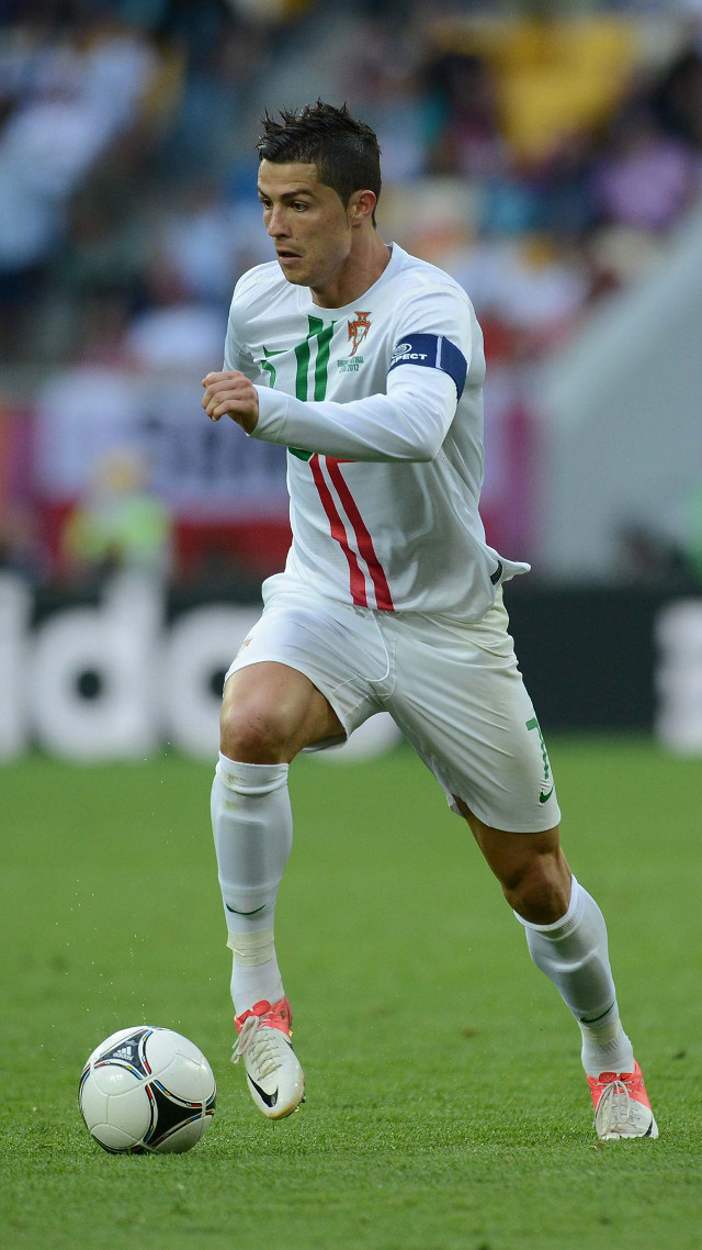 Man white uniform soccer field #2 free wallpaper - medium preview image