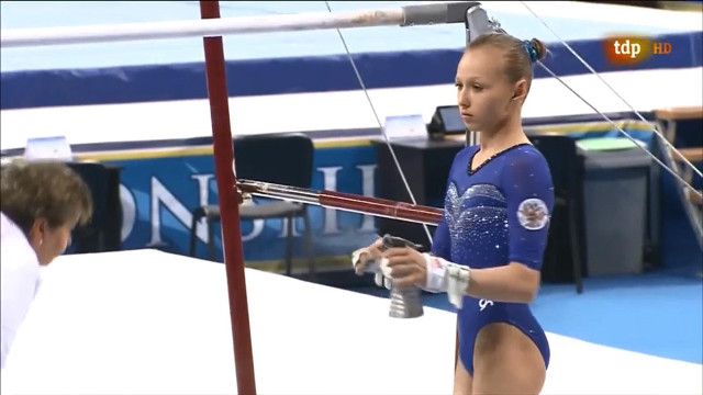 Woman blue leotard pole ball free wallpaper - medium preview image