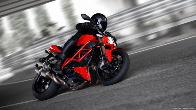 Red motorcycle driving street blurry free wallpaper - medium preview image