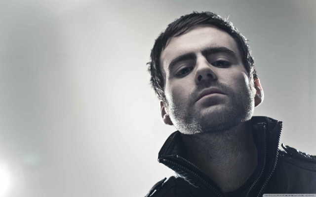 Bearded man black jacket sky free wallpaper - medium preview image