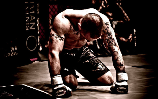 Man tattoos wrestling ring knee free wallpaper - medium preview image