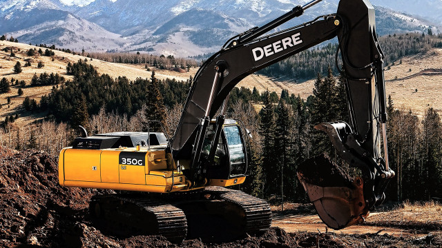 Large yellow excavator mountain background free wallpaper - medium preview image