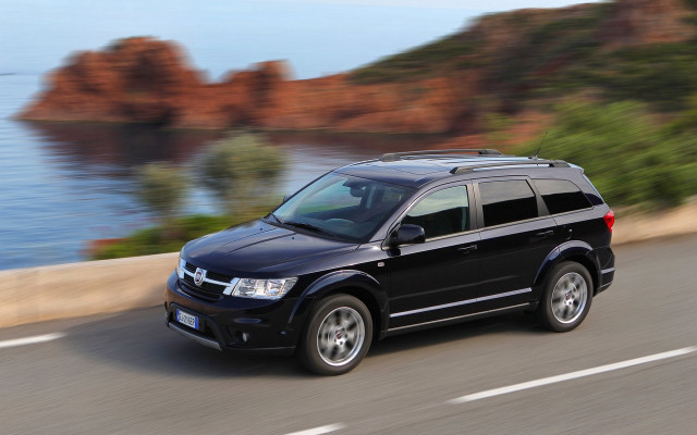 Black suv ocean road cliff free wallpaper - medium preview image