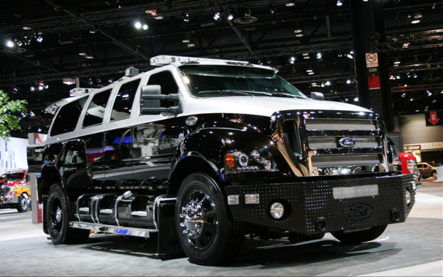 Black white truck showroom people free wallpaper - medium preview image