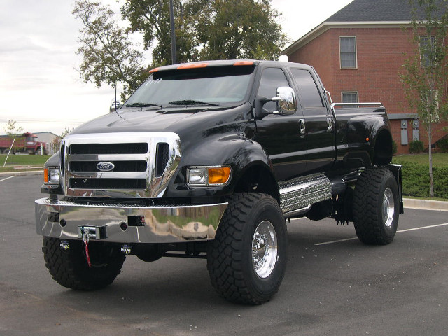 Black truck parking lot house free wallpaper - medium preview image
