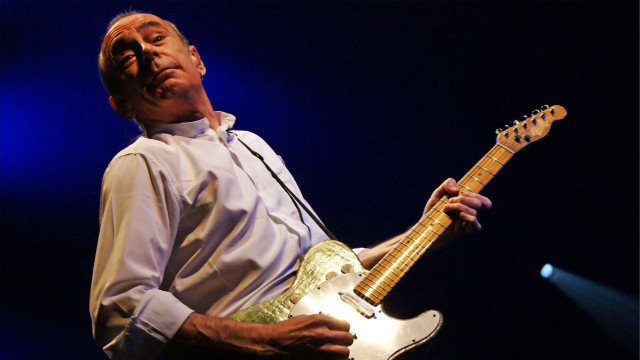 Man holding guitar stage microphone free wallpaper - medium preview image