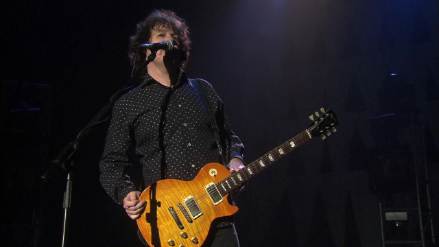 Man guitar stage microphone performance #2 free wallpaper - medium preview image