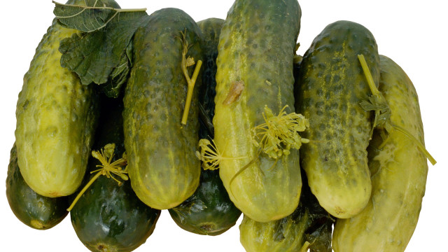 Cucumbers leaves stacked white surface free wallpaper - medium preview image