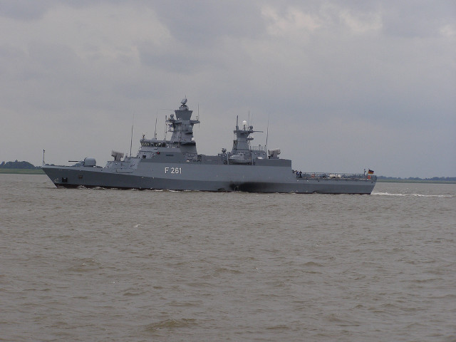 Battleship shoreline boat cloudy sky free wallpaper - medium preview image