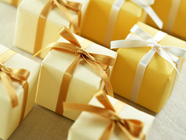 Wrapped presents with ribbons and free wallpaper - medium preview image