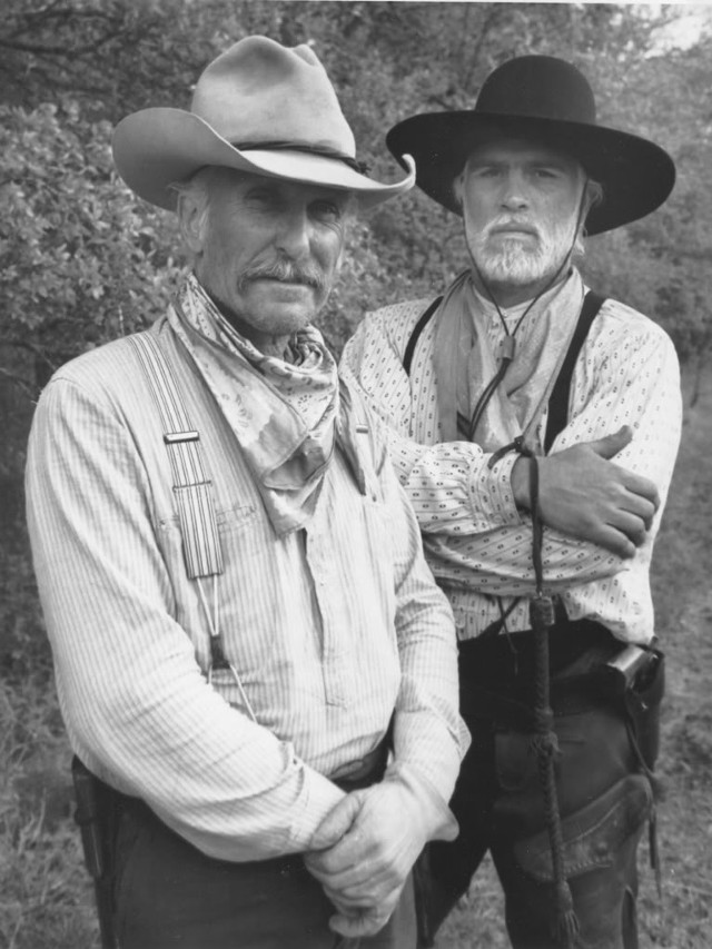 Two men cowboy hats field free wallpaper - medium preview image