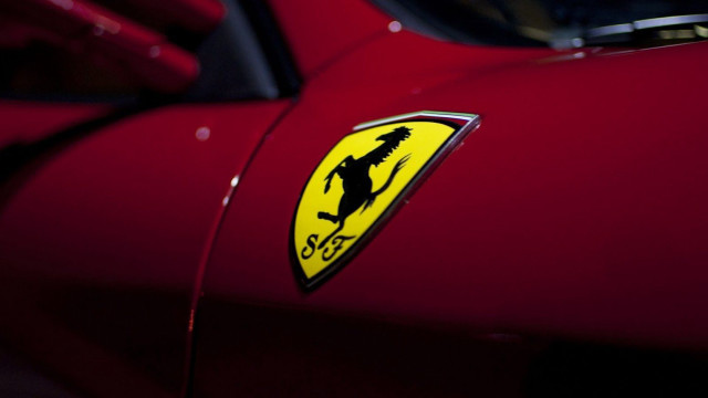 Red car yellow black logo free wallpaper - medium preview image