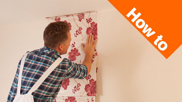 Man painting wall flowered wallpaper #3 free wallpaper - medium preview image
