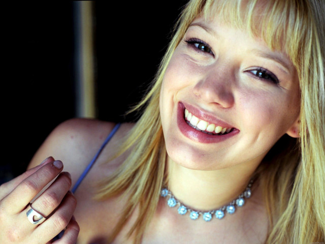Woman necklace ring smiling camera free wallpaper - medium preview image