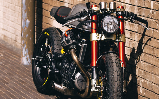 Motorcycle parked brick wall sidewalk #2 free wallpaper - medium preview image