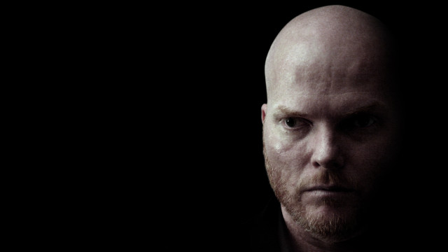 Bald man beard black shirt free wallpaper - medium preview image