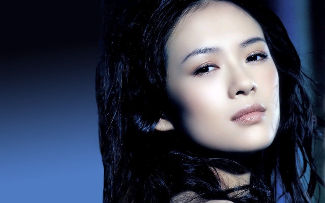 Woman black hair blue background free wallpaper - medium preview image