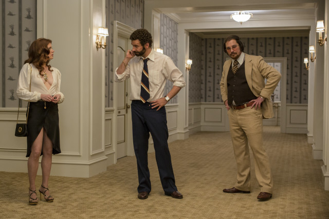 Man in suit hallway talking free wallpaper - medium preview image