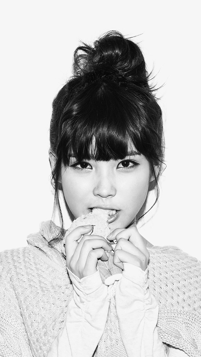 Woman messybun sweater eating food free wallpaper - medium preview image