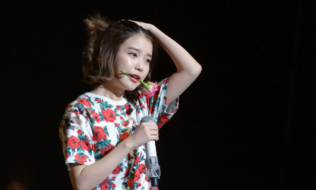 Young girl microphone flower mouth free wallpaper - medium preview image