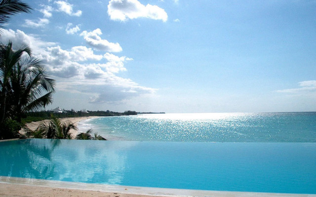 Large swimming pool ocean view free wallpaper - medium preview image