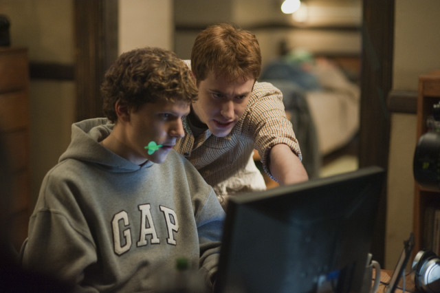 Boys looking computer screen room free wallpaper - medium preview image