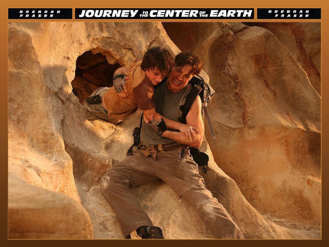 Two men climbing rock formation free wallpaper - medium preview image