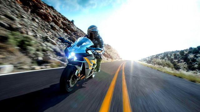 Motorcycle ride mountain road sky free wallpaper - medium preview image